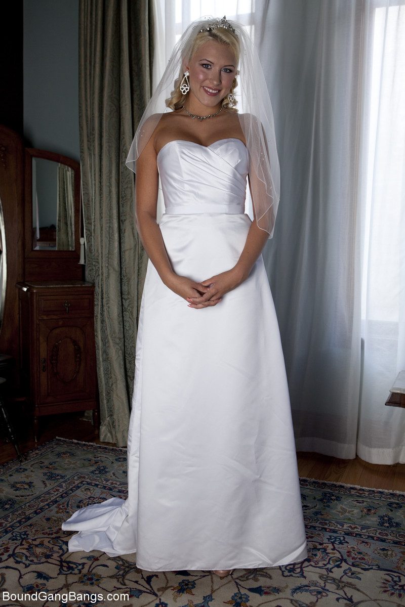 Blonde bride Katie Summers doffs her wedding dress & poses topless in lingerie   